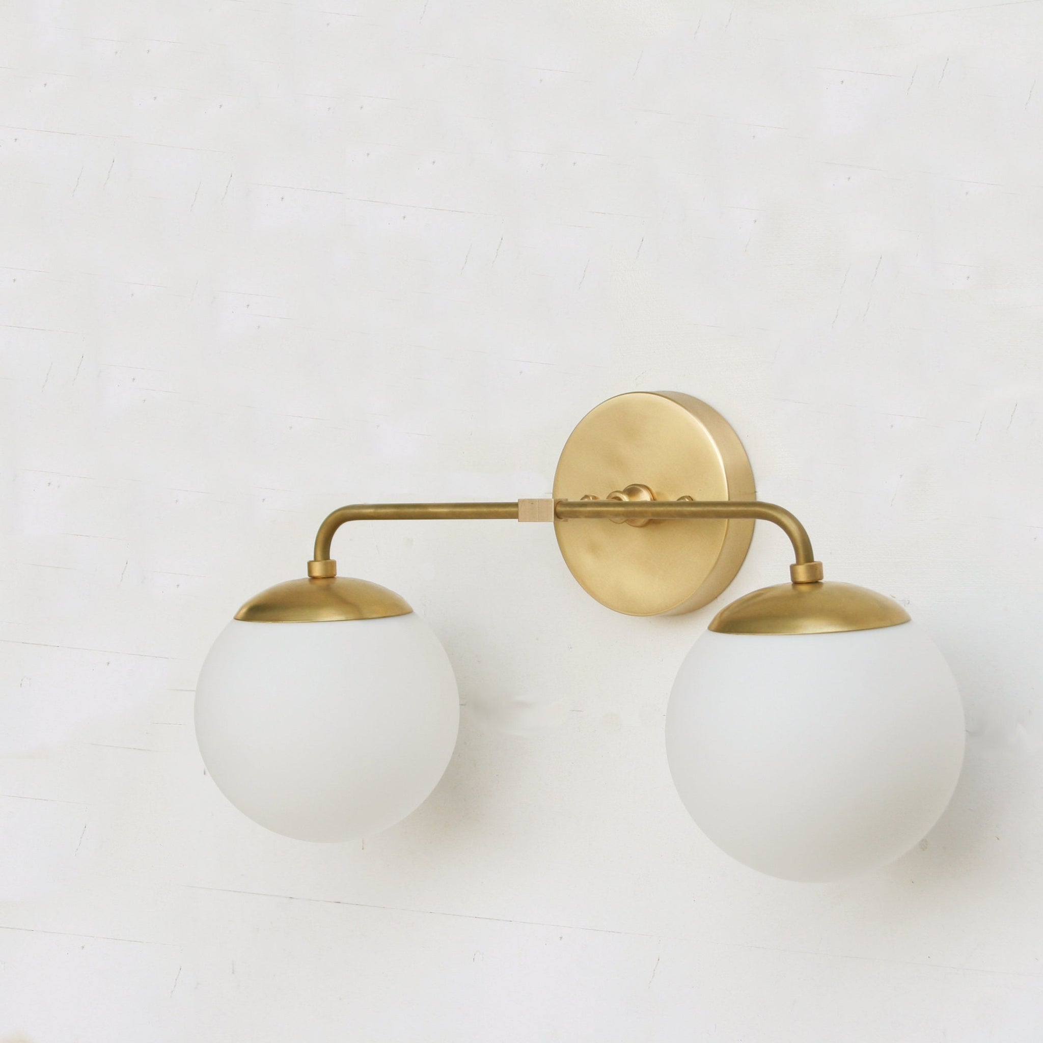 Two-Light Opal Globe Bathroom Vanity Wall Sconce