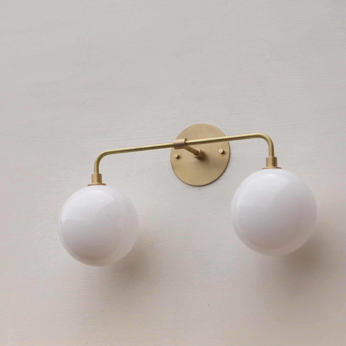 Two-Light Opal Globe Vanity Sconce
