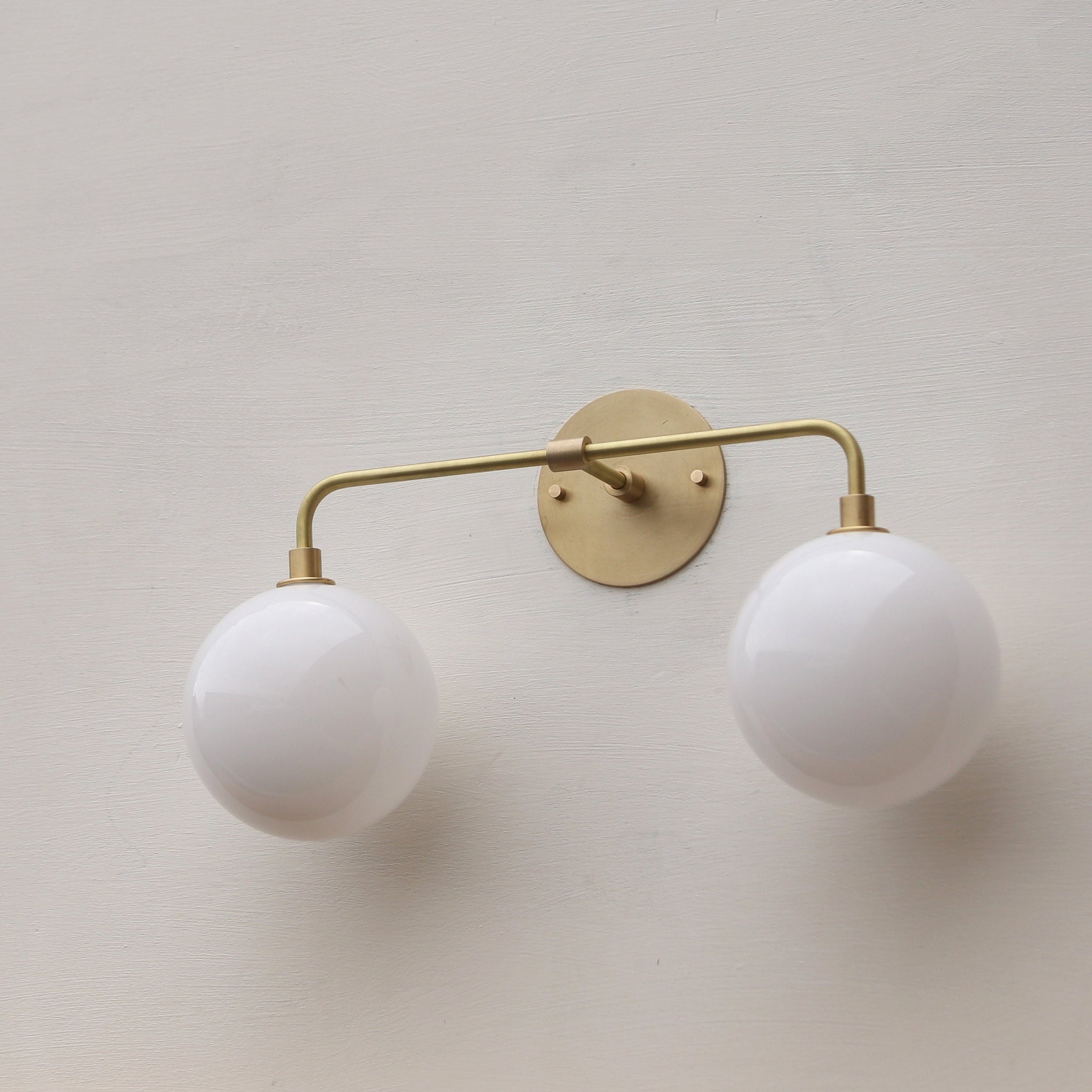 Two-Light Opal Globe Vanity Sconce