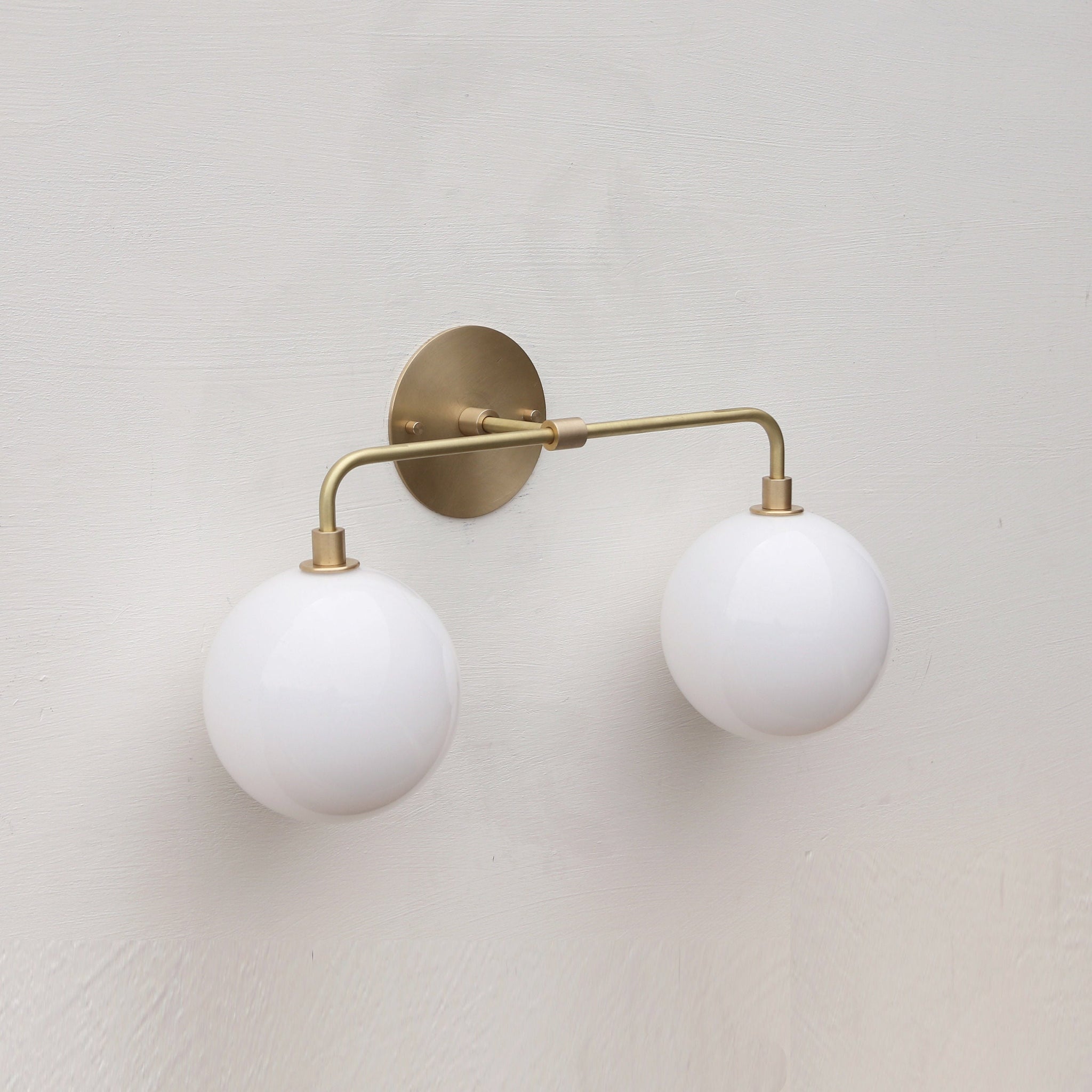Two-Light Opal Globe Vanity Sconce