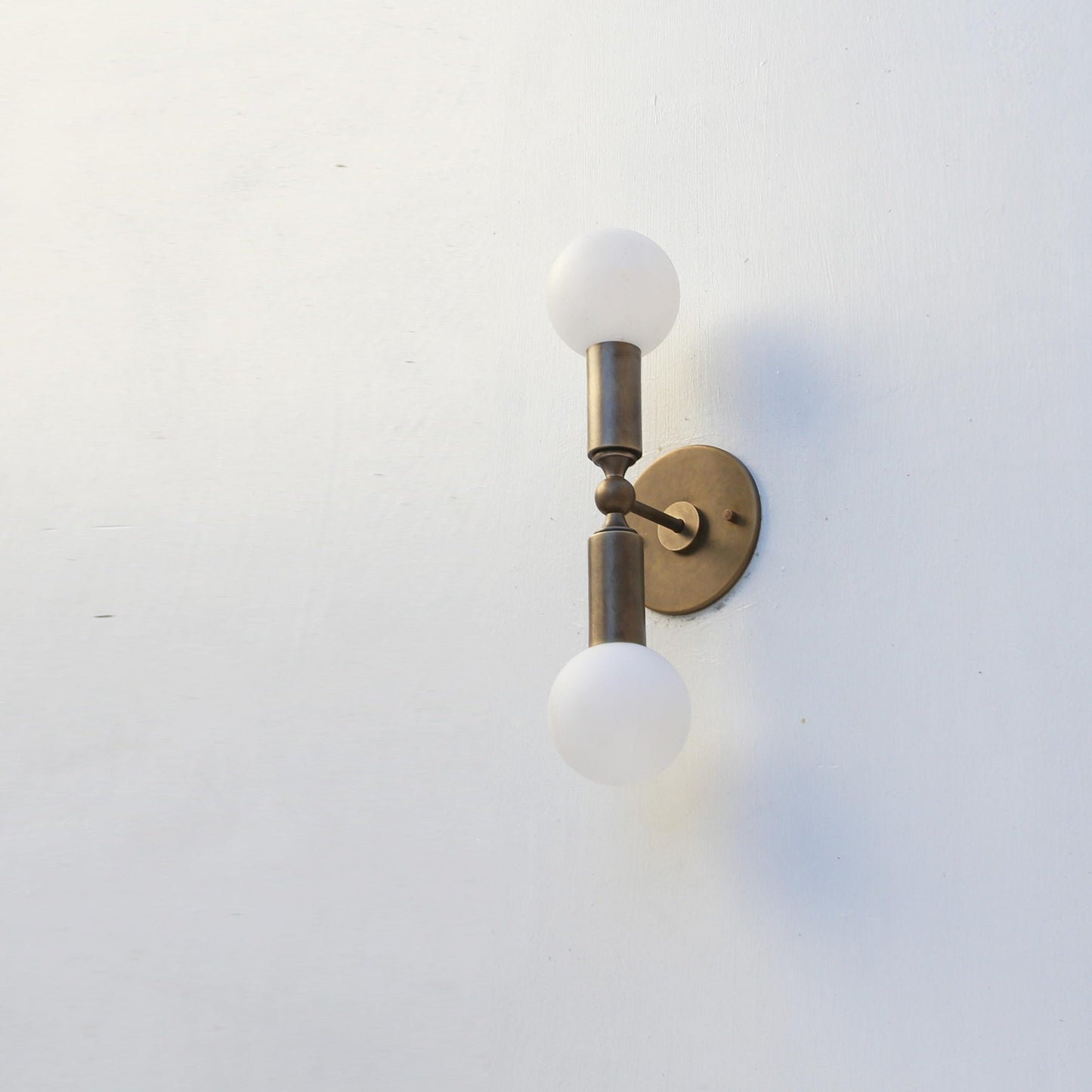 Two-Light Opal Globe Wall Sconce, 18 Inch