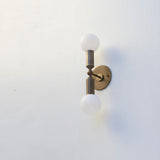 Two-Light Opal Globe Wall Sconce, 18 Inch