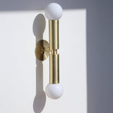 Two-Light Opal Globe Wall Sconce with Vertical Brass Arms