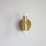 Two-Light Stacked Brass Wall Sconce with Exposed Bulbs