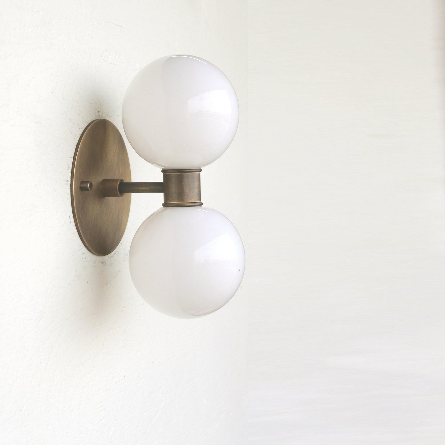 Two-Light Stacked Opal Globe Vanity Sconce