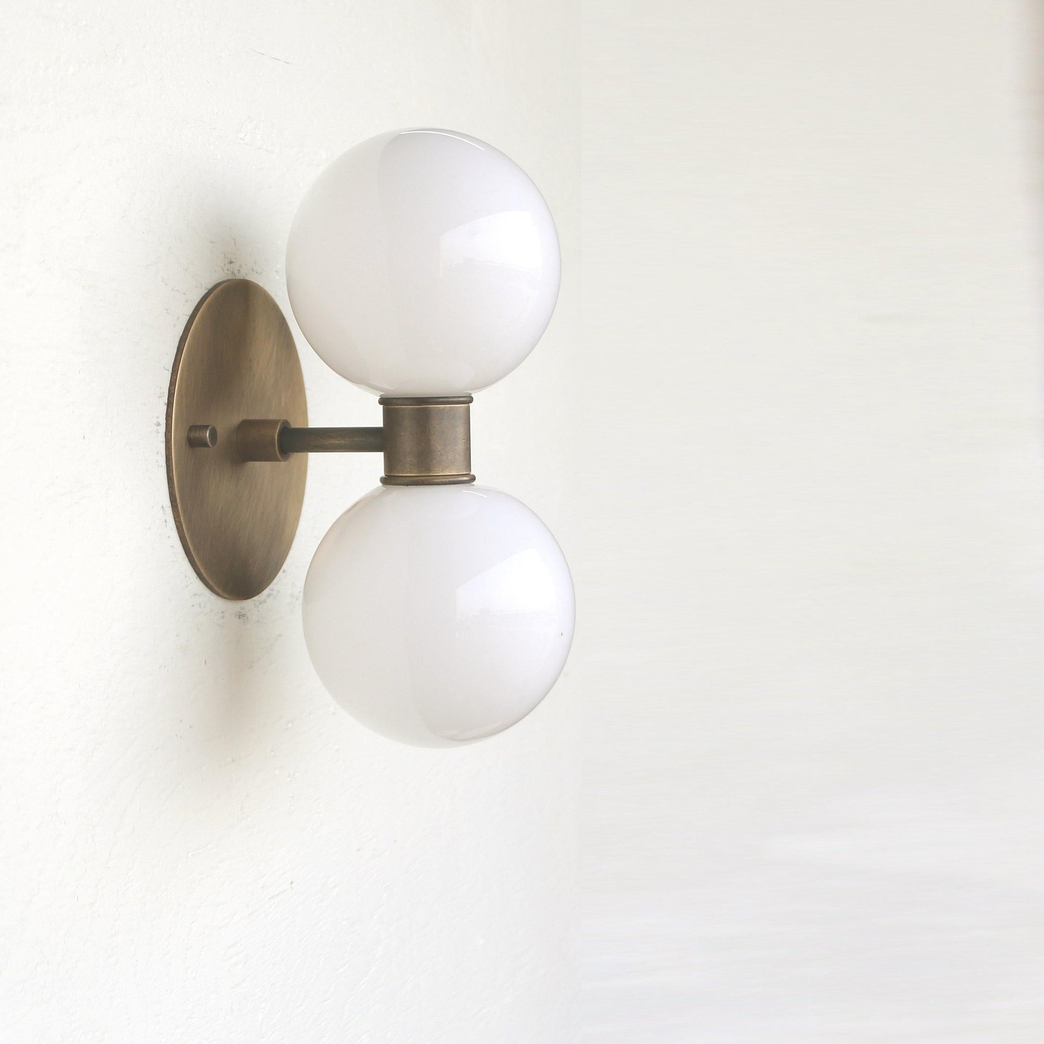 Two-Light Stacked Opal Globe Vanity Sconce