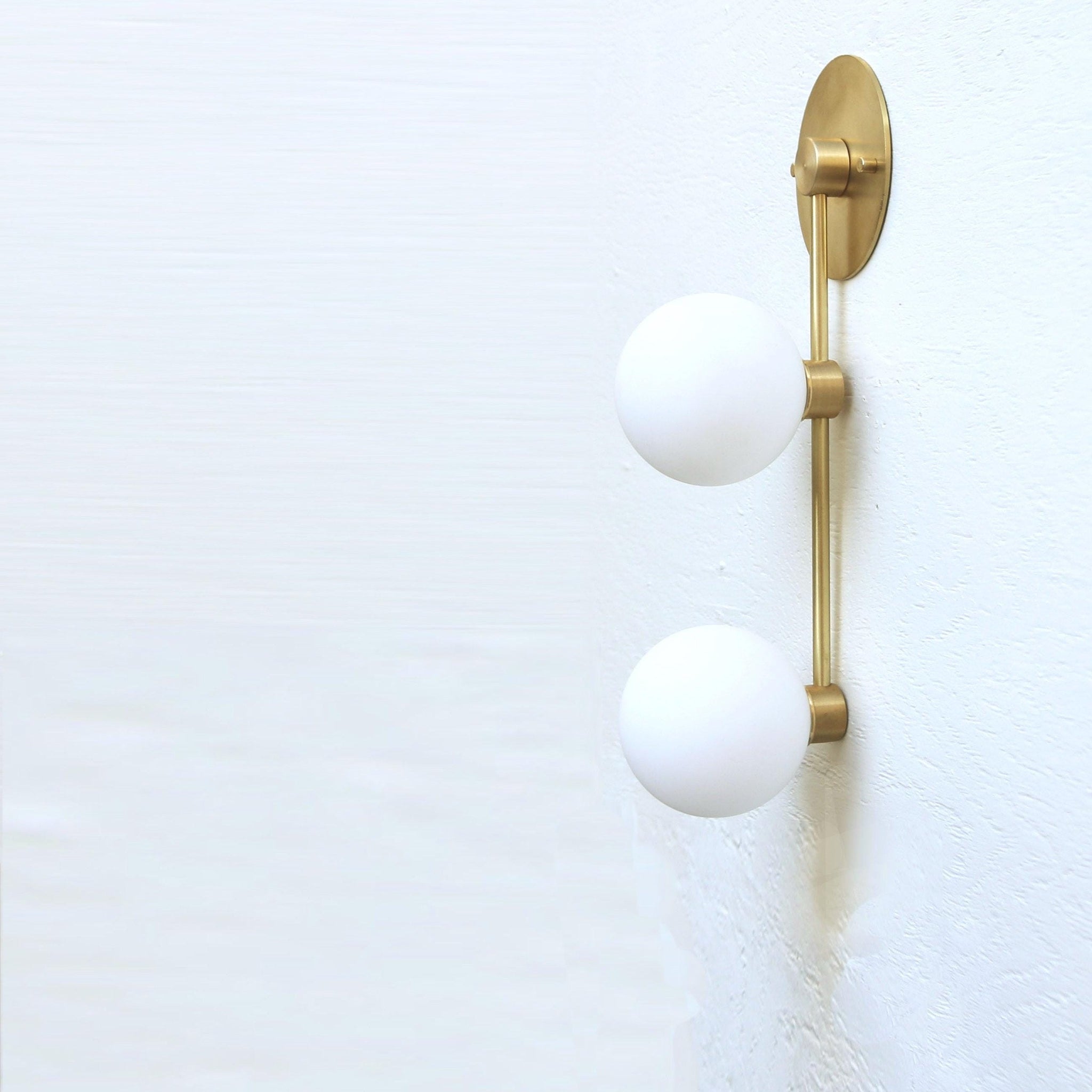 Two-Light Staggered Globe Wall Sconce
