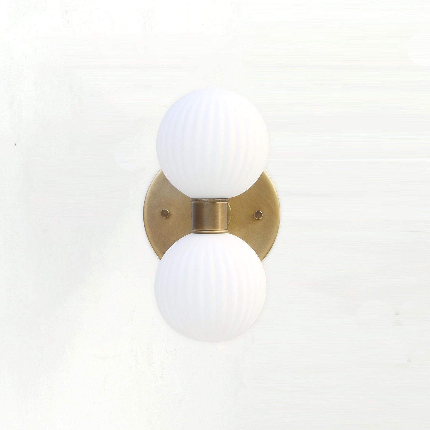 Two-Light Vertical Brass Wall Sconce with Ribbed Opal Globes