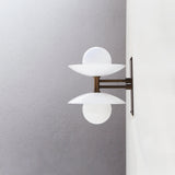 Two-Light Wall Sconce with Stacked Opal Glass Cone Shades