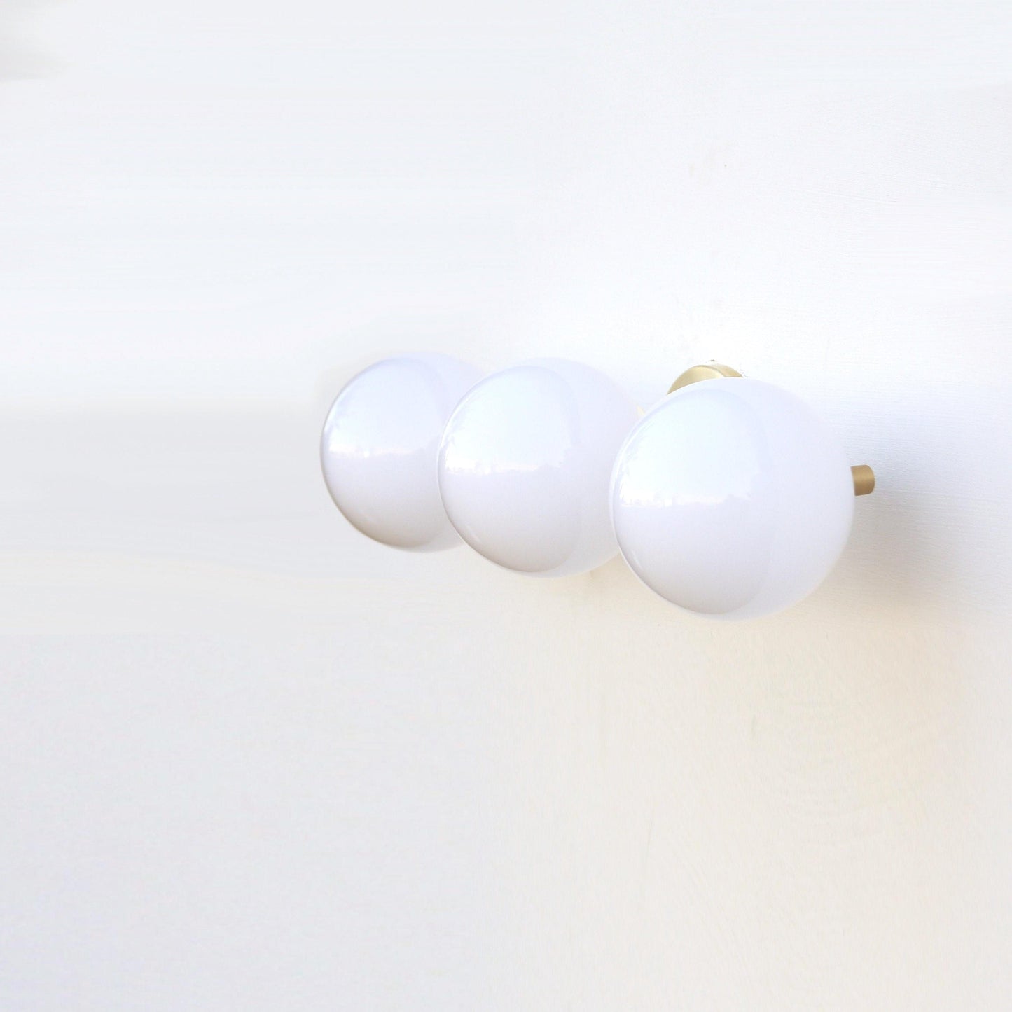 Wide Three-Light Brass Vanity Sconce with Six-Inch Opal Globes