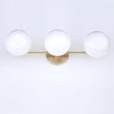 Wide Three-Light Brass Vanity Sconce with Six-Inch Opal Globes